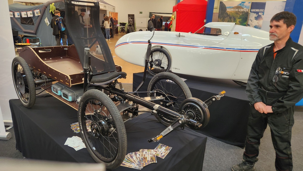 Katanga is one of several companies tackling the commercialization of quads that are in between a bike and a car. They've been using All-Axle hub motors on the side but may try gearing one to spin their differential rear axle on the next builds. 