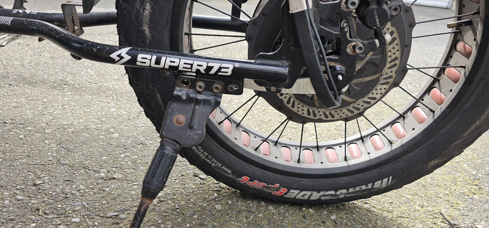I had to move the kickstand some centimetres and drill a couple of holes to install the torque arm.