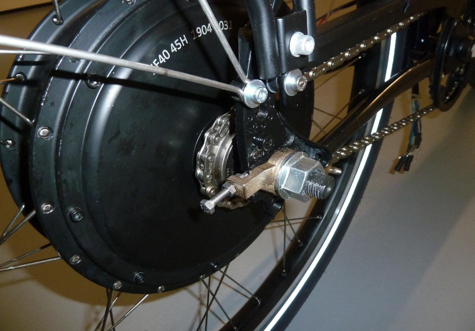 A torque arm with an integrated chain tensioner were printed in metal.