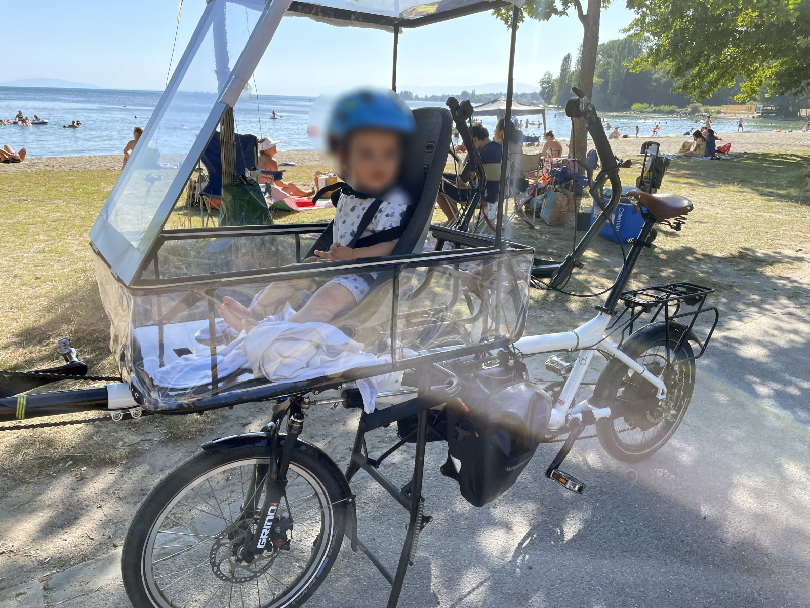 Chilling by the Lake Leman beach around his first birthday