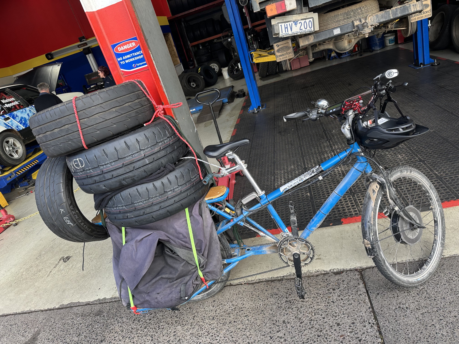 Car is on jackstands and needs new tyres... lets cargo bike the wheels to the tyre shop! This like all cargo times was a fun adventure!