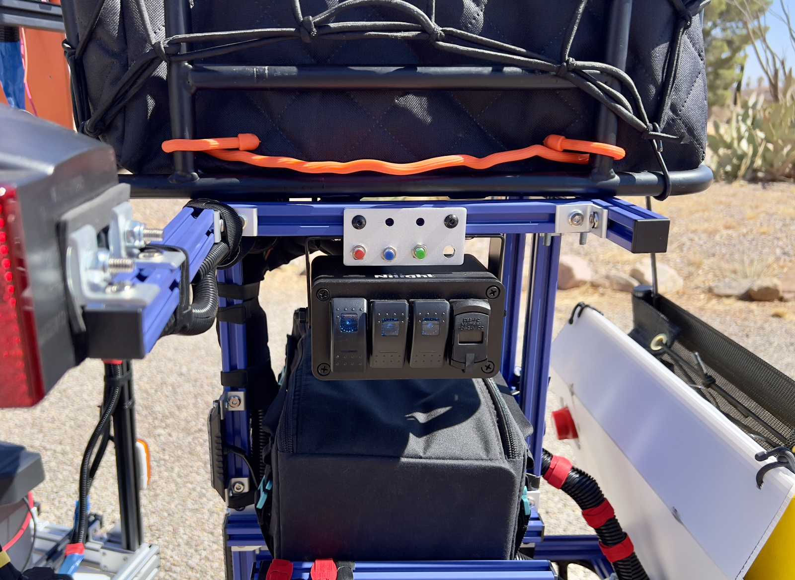 Big red flashers, small blue flashers, and small red flashers can be turn on/off from here. Push buttons select 1 of 17 flashing modes. The master switch for this box is located on the front of the trike on the right side of the